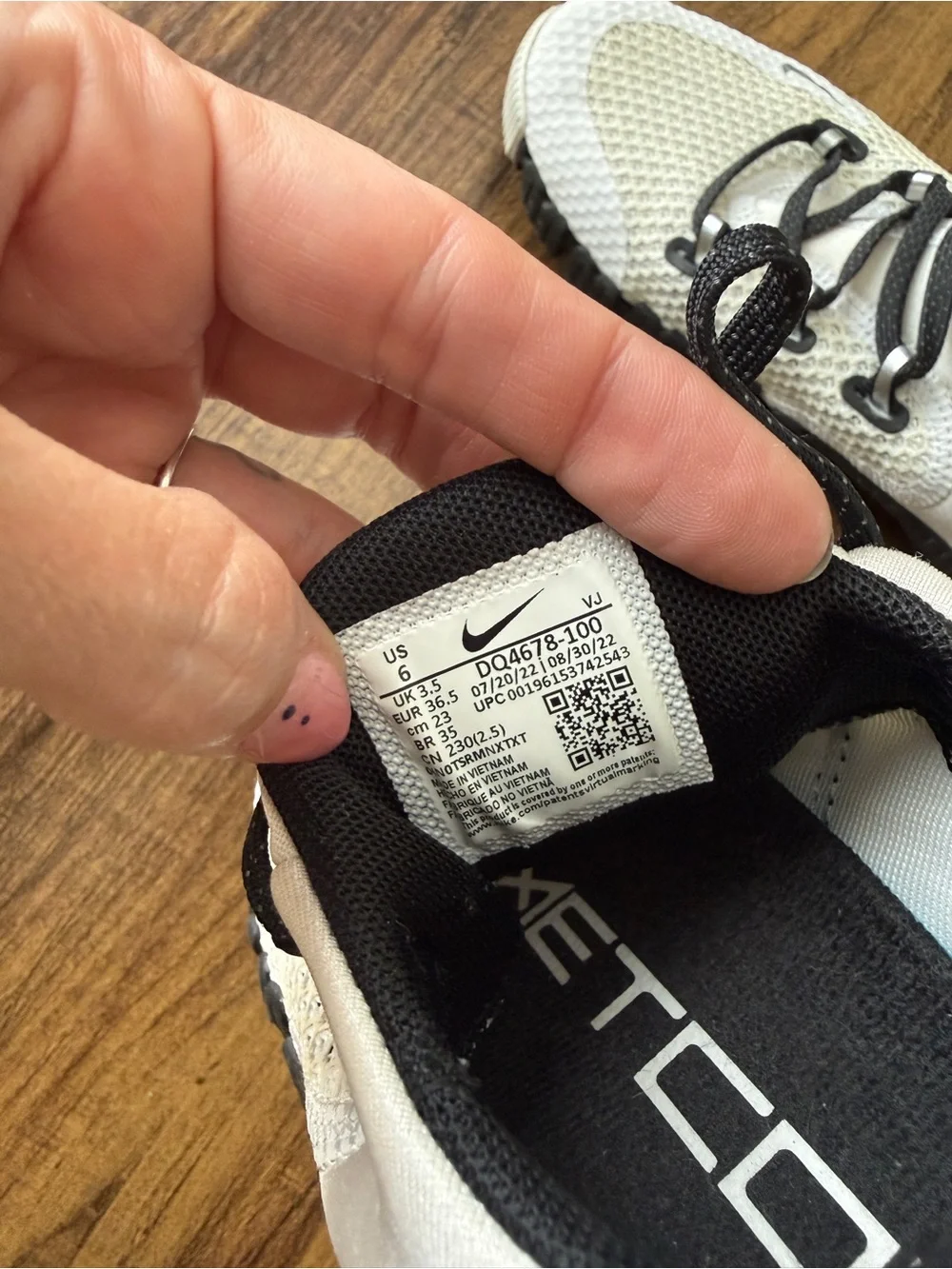 Nike Women's Metcon Sneakers in White and Black